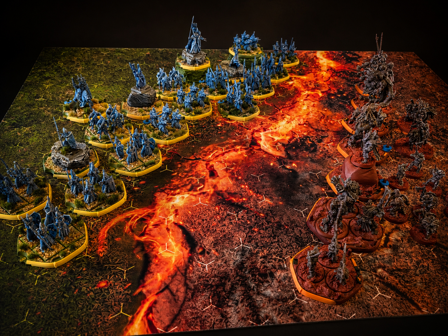 Compact hex-grid battlefield set up on a kitchen table